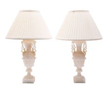 A pair of alabaster vase shaped table lamps;
