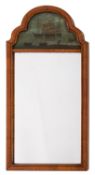 A walnut wall mirror in the early 18th-century style,