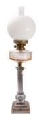 An Edwardian metal and moulded glass columnar table oil lamp,