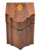 A George III mahogany and inlaid serpentine fronted knife box; bordered with boxwood lines,