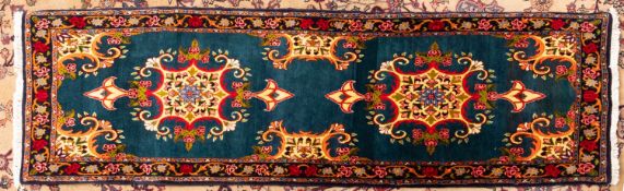 A Sarouk runner,