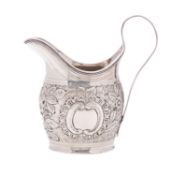 A George III silver cream jug.