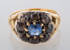 A late 19th century sapphire and diamond cluster ring,