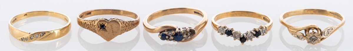 Five 9ct gold, gemset rings, including a diamond three-stone ring,