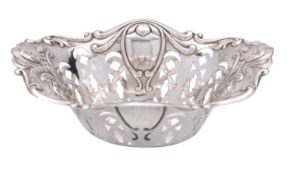An English Art Nouveau silver bonbon dish, George Wish, Sheffield 1908, of shaped oval form,