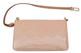 Louis Vuitton. A patent leather Amarante. pouch, with dust bag in original box.