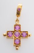 A Greek crucifix pendant, set with pink sapphires, stamped with maker's mark 'LRG',