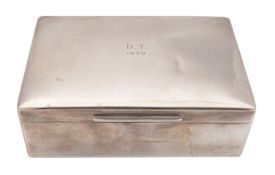 A George V silver cigarette casket, William Comyns & Sons, London 1937, of rectangular form,