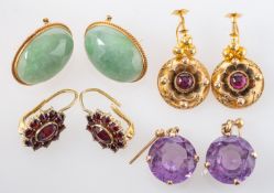 Four pairs of earrings, including a pair of jade ear studs,