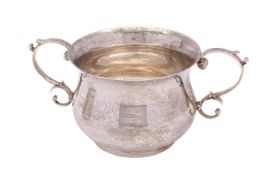 An Edward VI silver porringer, Edward John Haseler & Noble Haseler, London 1909,