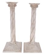 A pair of George V silver Corinthian column candlesticks, maker William Hutton and Son Ltd,