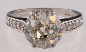 A round, brilliant-cut diamond, single-stone ring, accompanied by IGL report nr.