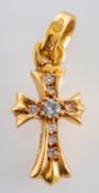 A Chrome Hearts crucifix charm, with round, brilliant-cut diamonds,