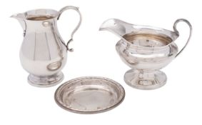 An Elizabeth II silver sparrow beak cream jug, B.