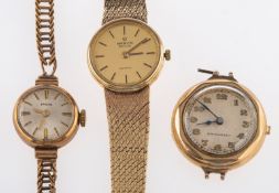 Marvin a gold quartz wristwatch, the dial with raised baton numerals and signed Marvin Revue,