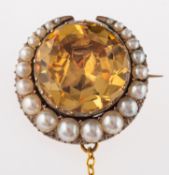 A late Victorian gem set brooch,
