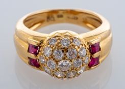 An 18ct gold diamond and synthetic ruby cluster ring,