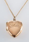 A heart-shaped locket pendant, stamped '9ct B&F', length of pendant (exl jump ring), ca. 2.