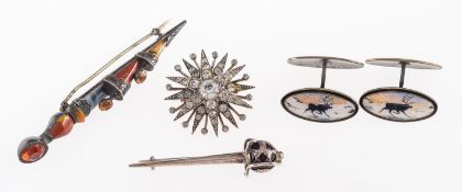 A Scottish silver and agate Sgian Dubh brooch; silver sword brooch;