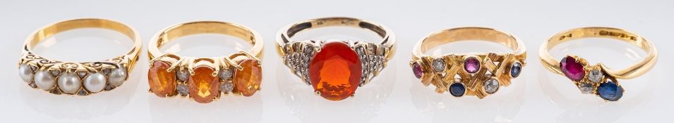 Five gemset rings, including an 18ct gold, sapphire,