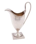 A George III silver cream jug, Thomas Ollivant (Manchester) over struck AB- possibly Anne Bateman,