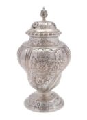 A Victorian silver sugar caster and cover, maker's mark rubbed possibly Gibson and Longman,