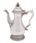 A George III silver coffee pot, maker's mark *J.