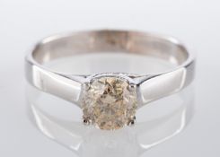 A single stone diamond ring, the round brilliant cut stone claw set, estimated diamond weight 0.