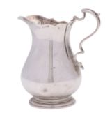 A George VI silver cream jug, maker Roberts & Belk Ltd, Sheffield, 1951, in the George III style,