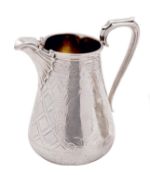A Victorian silver milk jug, maker Edward & John Barnard, London 1869, of inverted tapering form,