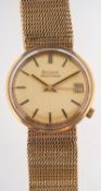 Bulova Accutron, a gentleman's gold wristwatch, the dial with raised baton numerals, matching hands,