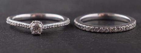 Two 18ct gold and diamond rings designed by Jenny Packham, both signed,