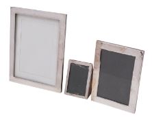 An Edward VII silver desk photo frame and paper weight, Charles Penny Brown, Birmingham 1905,