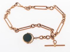 A 9ct Albert chain, composed of trombone links suspending a bloodstone fob,