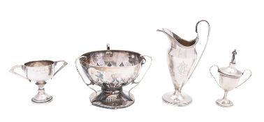 A George V silver cream jug, Jay, Richard Attenborough Co Ltd, Chester 1934, of helmet form,