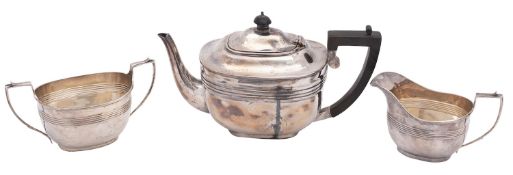 A George V matched silver three piece tea set, teapot London 1927,