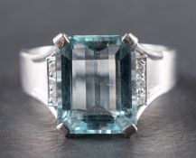 An octagonal, step-cut aquamarine and single-cut diamond ring, estimated aquamarine weight ca.