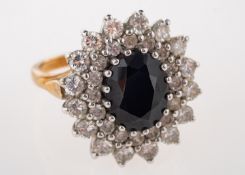 A sapphire and synthetic cubic zirconia cluster ring,