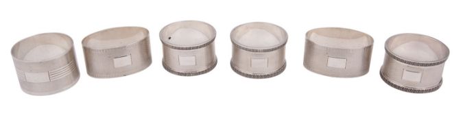 A set of three George V silver napkin rings, H F Withers, Birmingham 1945, of heavy gauge,