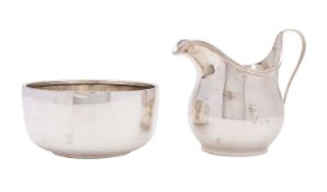 A George VI silver cream jug, James Henry & Herbert Barraclough, London 1937, of classical form,