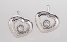 A pair of Chopard 'Happy Diamond', heart-shaped ear studs, signed Chopard,