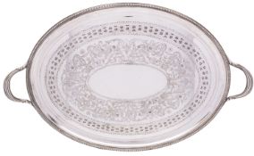 A large Edwardian silver-plated tray, maker Henry Wilkinson & Co, Sheffield, of oval form,