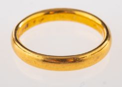 A 22ct gold wedding band, stamped 22 with full Birmingham hallmarks for 1930, ring size L,
