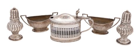A pair of Victorian silver pepperettes, James Deakin & Sons, Chester 1894,