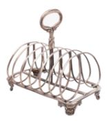 A Victorian silver toast rack, Henry Wilkinson and Co, Sheffield 1852, of rectangular form with,