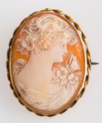 A shell cameo brooch, depicting the bust of a lady in profile, total length ca. 4.