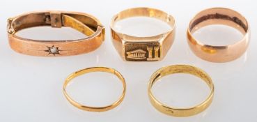 An 18ct gold ring, the polished band, stamped 18 with full London hallmarks for 1973,
