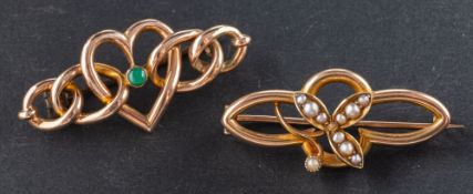 Two openwork brooches, including a seed pearl brooch with floral motif, stamped '15CT', length ca.
