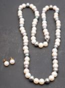 A single-row, cultured pearl necklace and pair of cultured pearl ear studs,