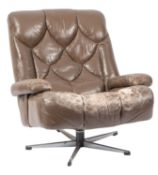 A leather upholstered lounge swivel chai